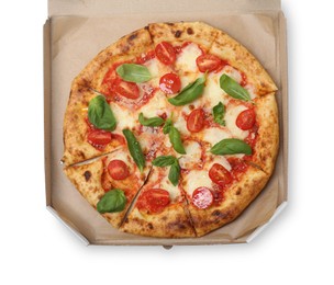 Photo of Delicious Margherita pizza in cardboard box isolated on white, top view