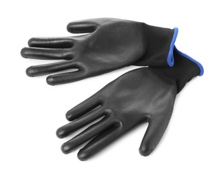 Protective gloves isolated on white, top view. Safety equipment