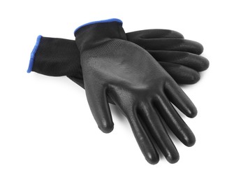 Photo of Protective gloves isolated on white. Safety equipment