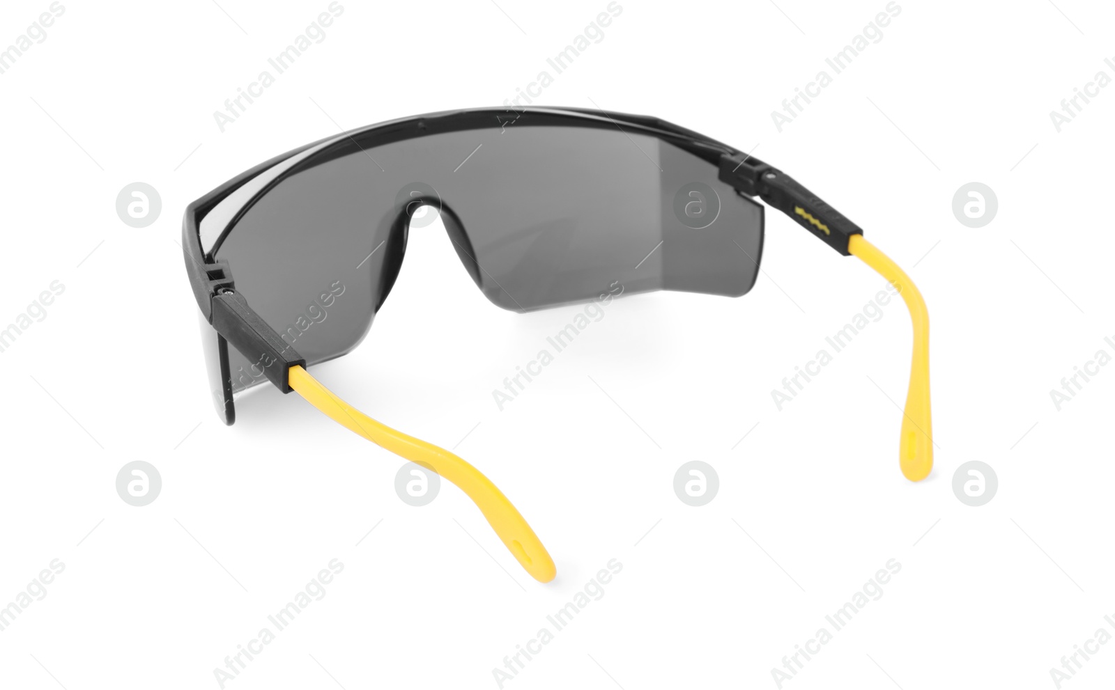 Photo of Protective goggles isolated on white. Safety equipment