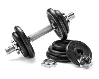 Metal dumbbell and parts on white background. Sports equipment