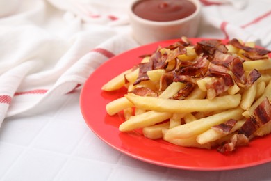 Photo of Delicious French fries with bacon on white tiled table, closeup. Space for text