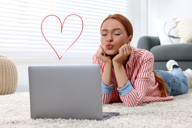 Image of Long distance relationship. Young woman sending air kiss to her loved one via video chat indoors. Red heart near her