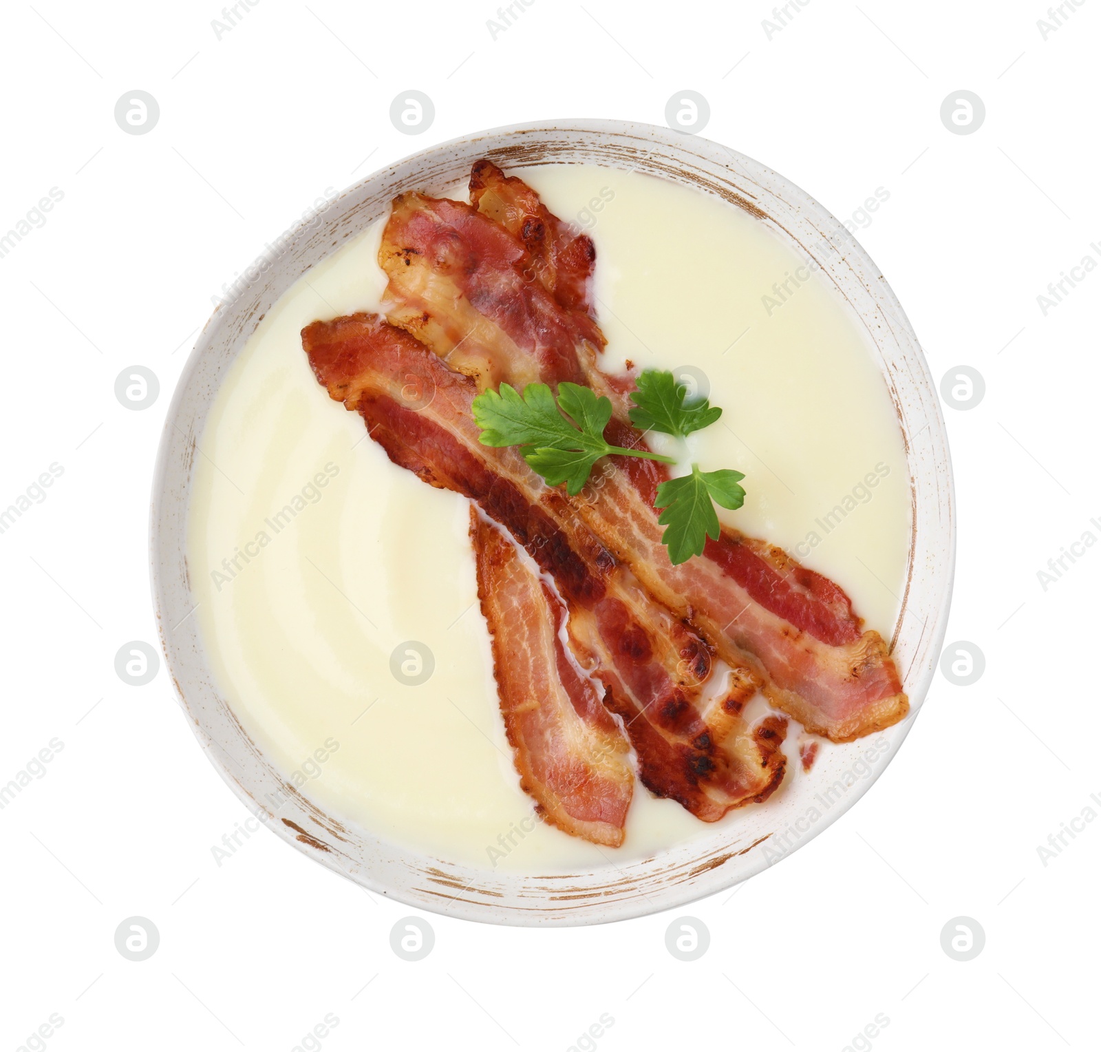 Photo of Delicious potato soup with bacon and parsley isolated on white, top view