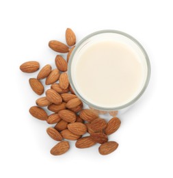 Glass of almond milk and almonds isolated on white, top view