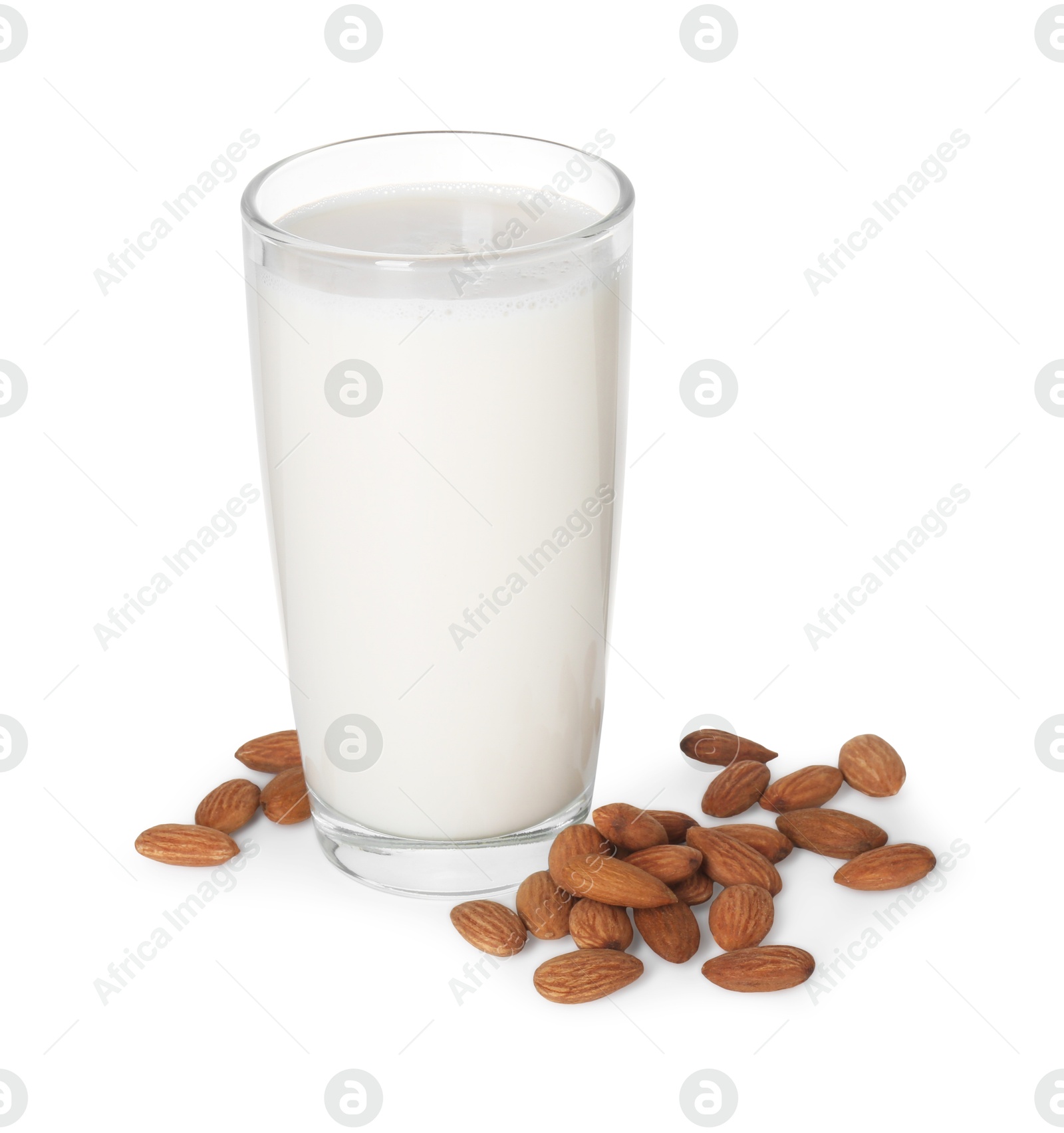 Photo of Glass of almond milk and almonds isolated on white