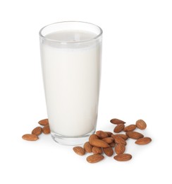 Glass of almond milk and almonds isolated on white