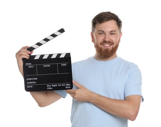 Making movie. Smiling man with clapperboard on white background