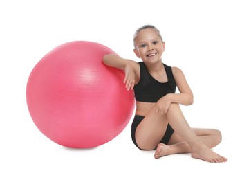 Cute little girl with fit ball on white background