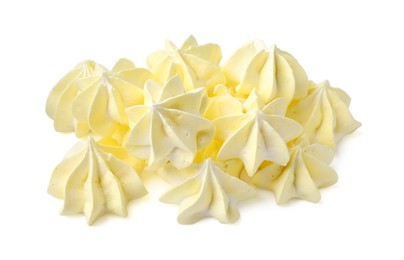 Photo of Many delicious meringue cookies isolated on white