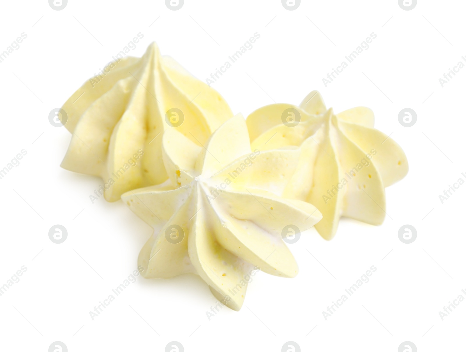 Photo of Three delicious meringue cookies isolated on white