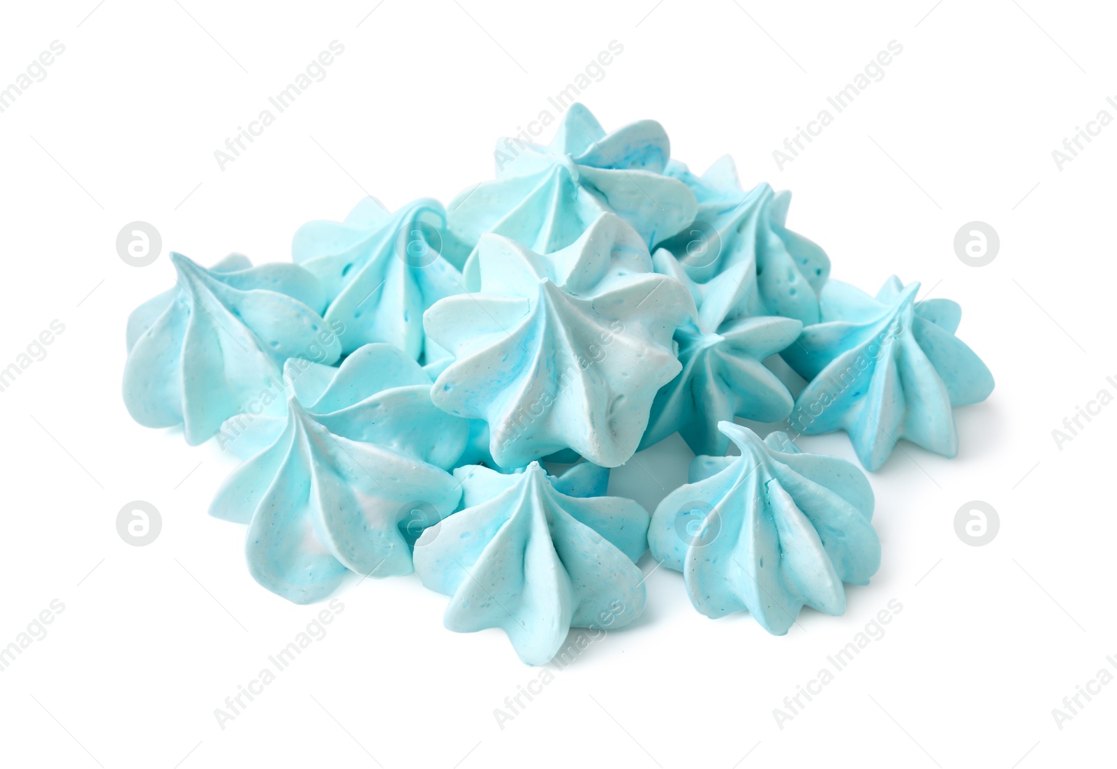 Photo of Many delicious meringue cookies isolated on white