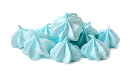 Photo of Many delicious meringue cookies isolated on white