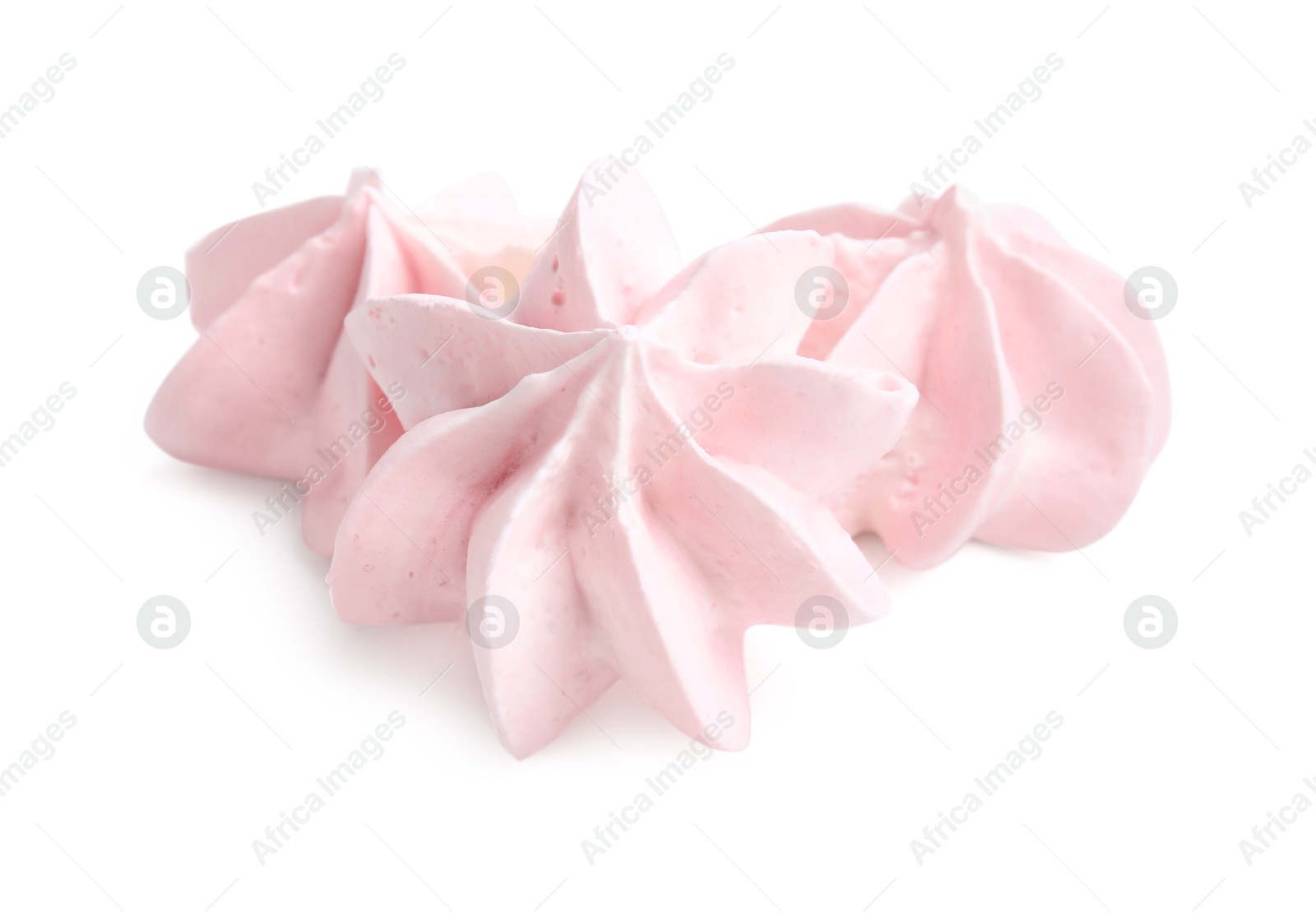 Photo of Three delicious meringue cookies isolated on white