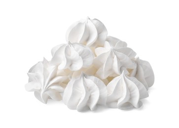 Photo of Many delicious meringue cookies isolated on white