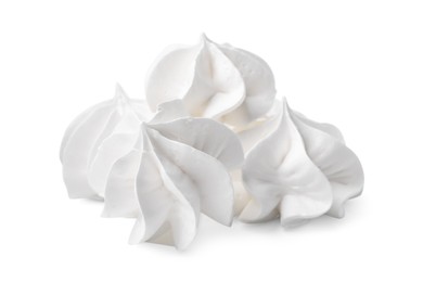 Many delicious meringue cookies isolated on white