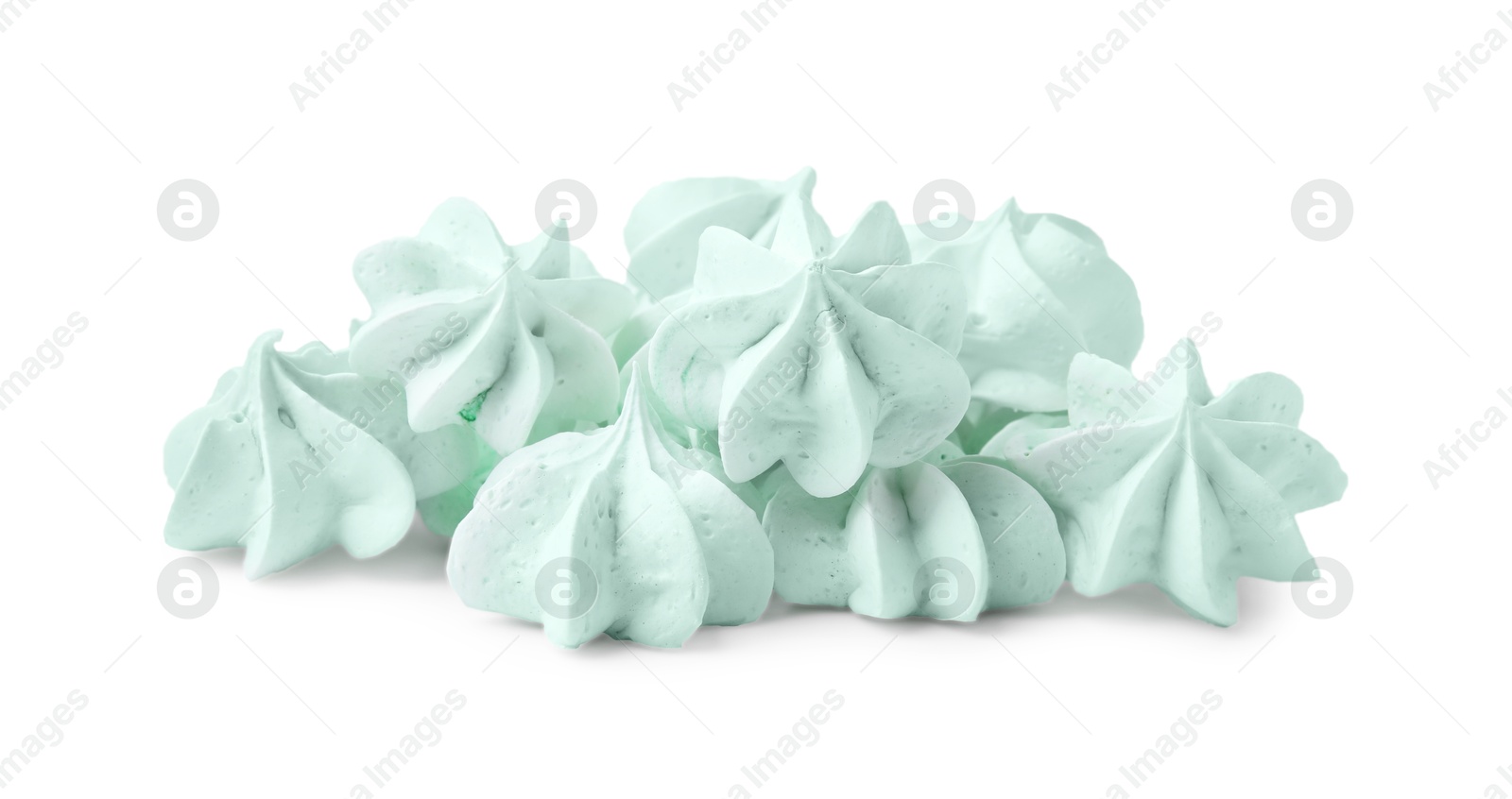 Photo of Many delicious meringue cookies isolated on white