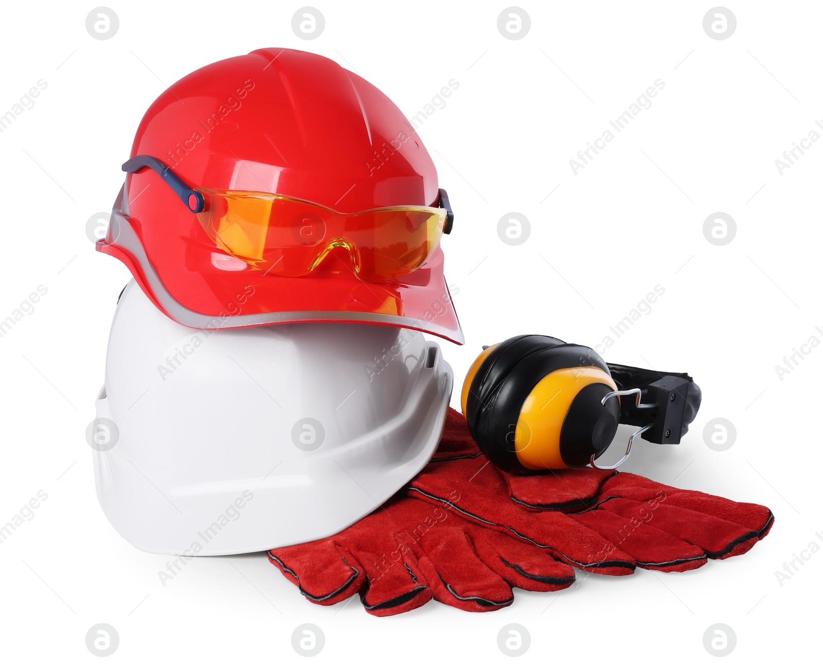 Photo of Hard hats, protective gloves and earmuffs isolated on white