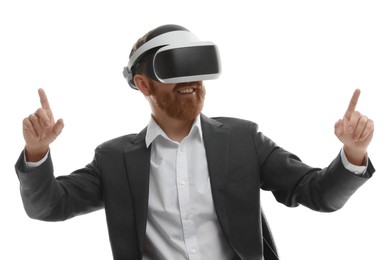 Photo of Smiling man using virtual reality headset while sitting in office chair on white background