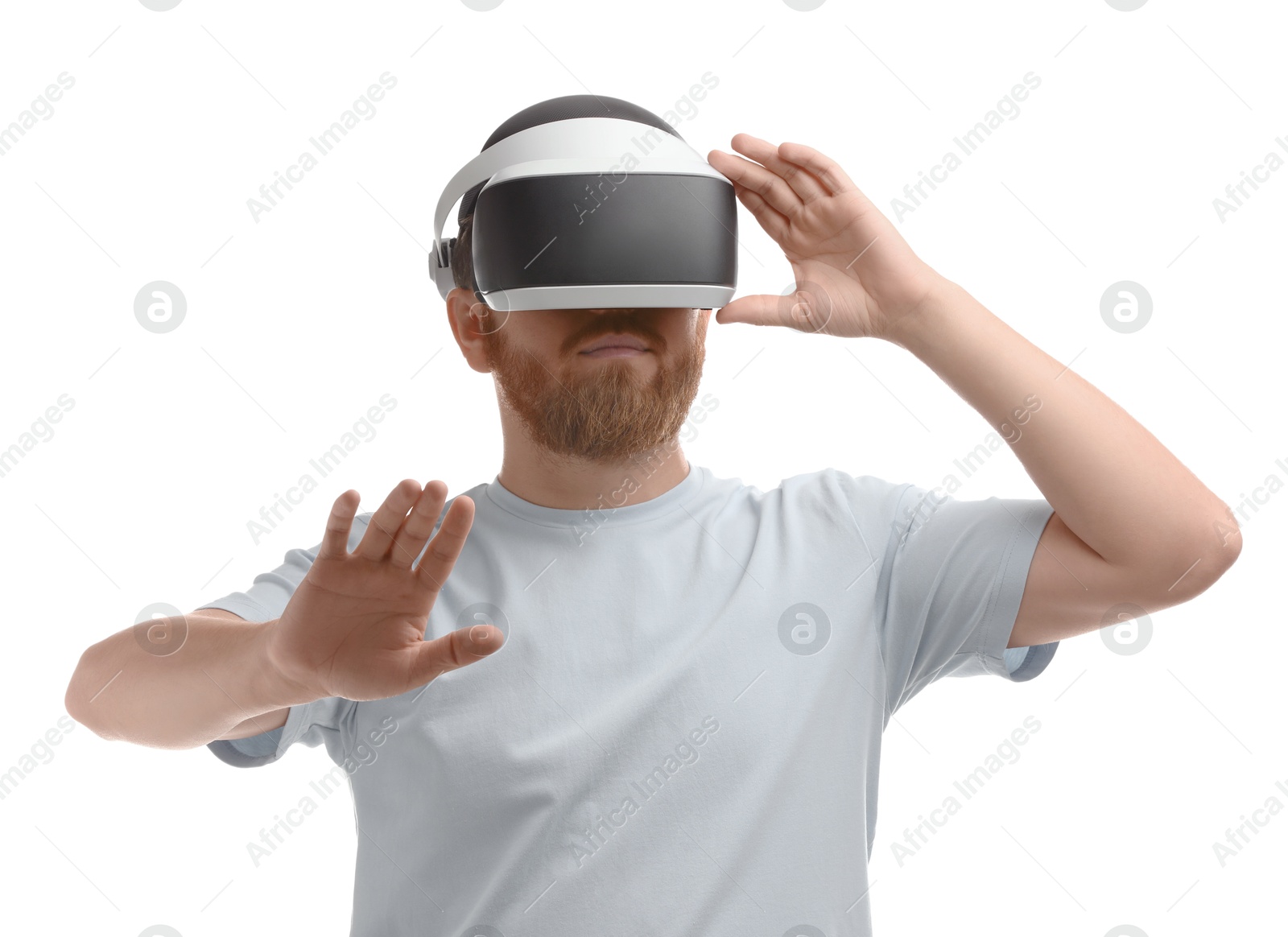 Photo of Man using virtual reality headset on white background