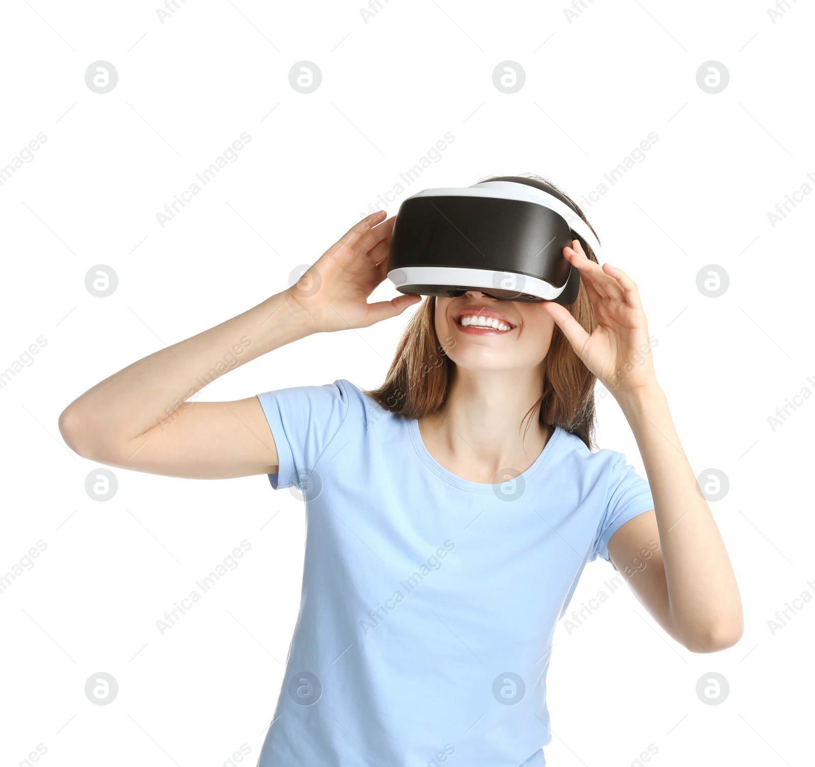 Photo of Smiling woman using virtual reality headset on white background