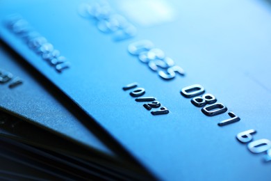 Photo of Many credit card as background, macro view