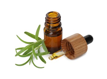 Photo of Aromatic essential oil in bottle, pipette and rosemary isolated on white