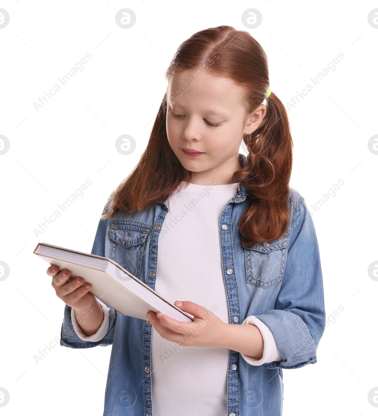 Photo of Cute little girl with book on white background