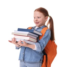 Smiling girl with stack of books on white background