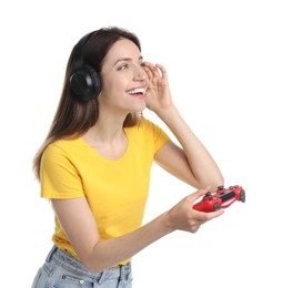 Photo of Happy woman in headphones playing video game with controller on white background