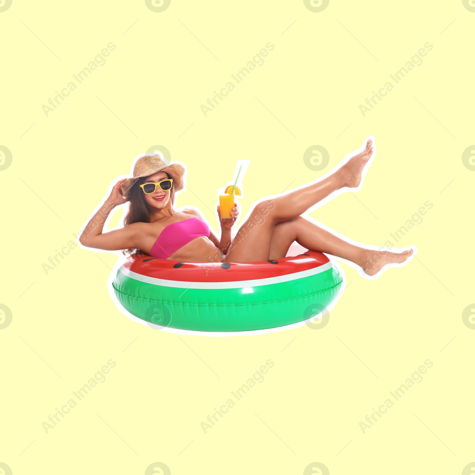 Image of Happy woman with cocktail and inflatable ring on beige background. Summer vibe