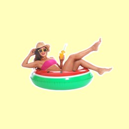 Image of Happy woman with cocktail and inflatable ring on beige background. Summer vibe