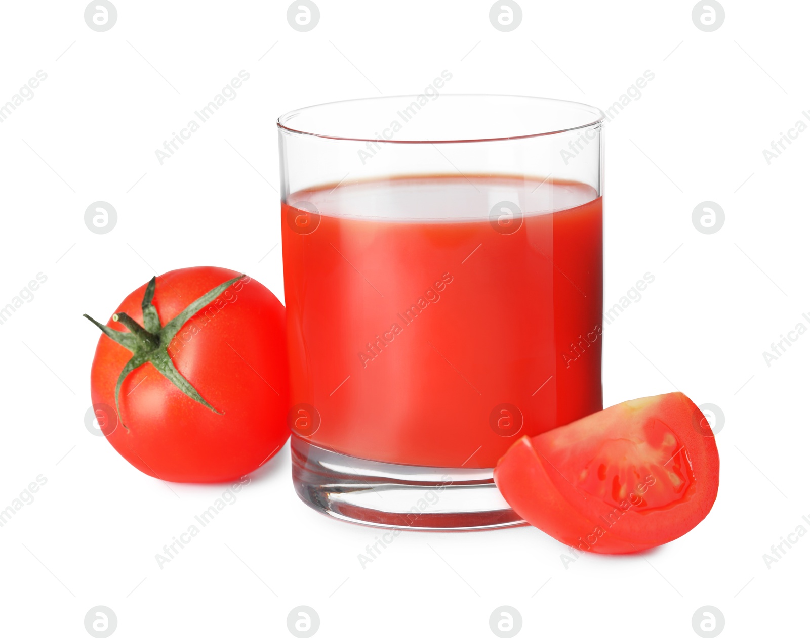 Photo of Tasty tomato juice in glass and fresh vegetables isolated on white