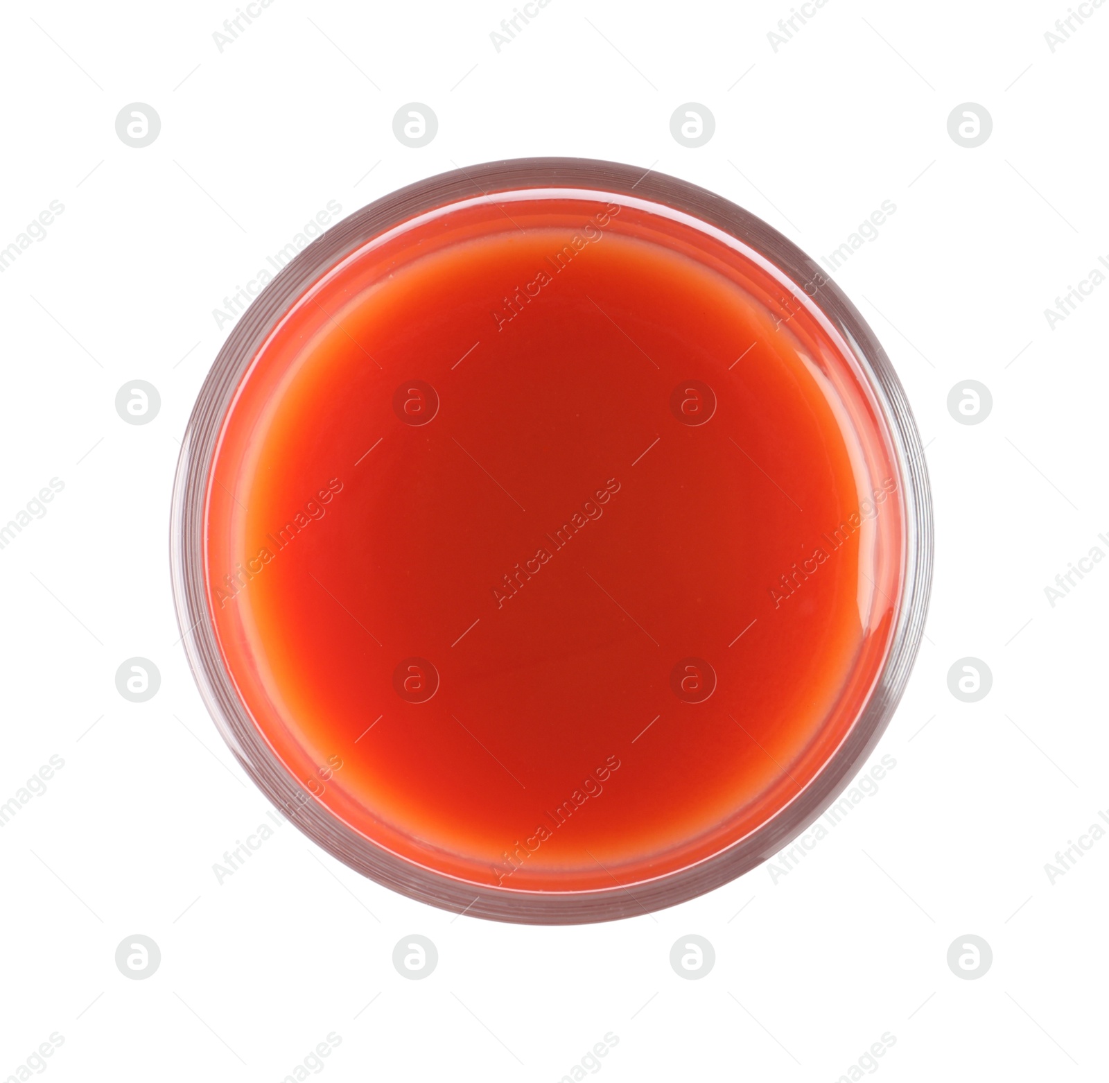 Photo of Fresh tomato juice in glass isolated on white, top view