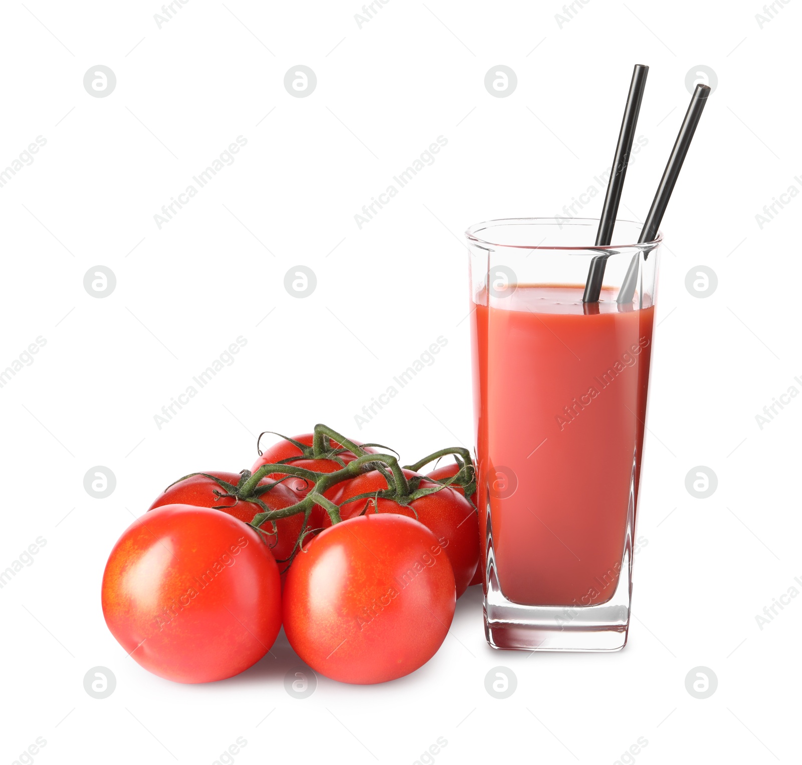 Photo of Tasty tomato juice in glass and fresh vegetables isolated on white