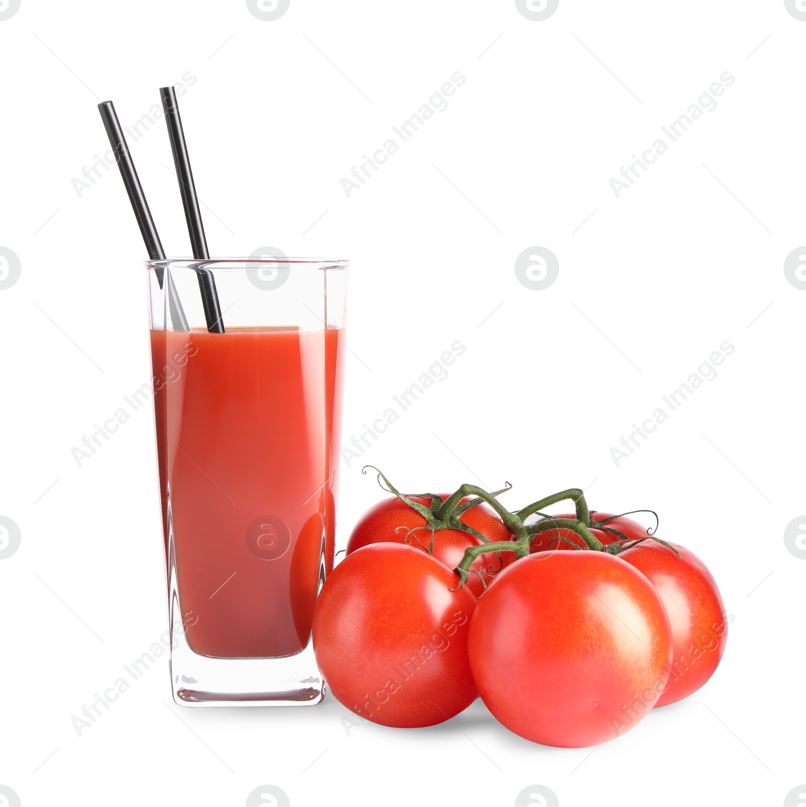 Photo of Tasty tomato juice in glass and fresh vegetables isolated on white