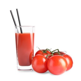 Tasty tomato juice in glass and fresh vegetables isolated on white