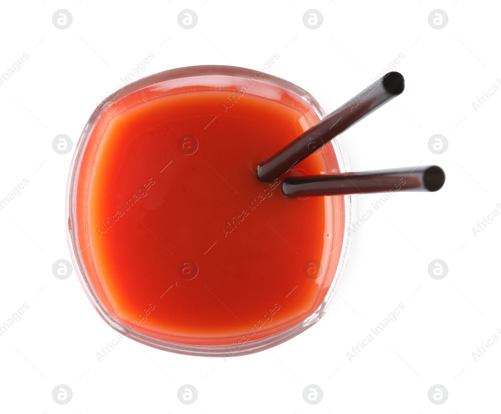 Photo of Fresh tomato juice with straws in glass isolated on white, top view