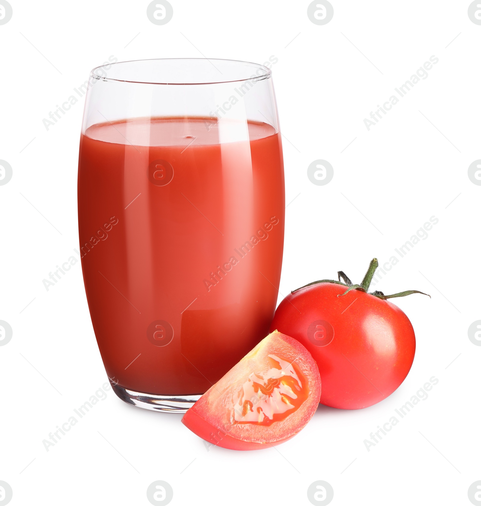 Photo of Tasty tomato juice in glass and fresh vegetables isolated on white