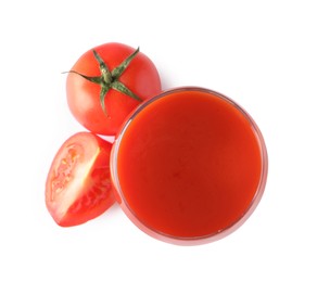 Tasty tomato juice in glass and fresh vegetables isolated on white, top view