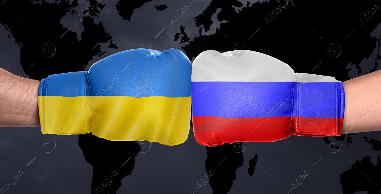 Image of Political conflict, banner design. Men in boxing gloves with flags of Russia and Ukraine fighting against world map, closeup