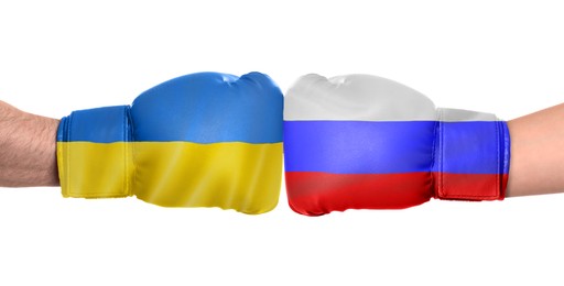 Image of Political conflict. Men in boxing gloves with flags of Russia and Ukraine fighting on white background, closeup