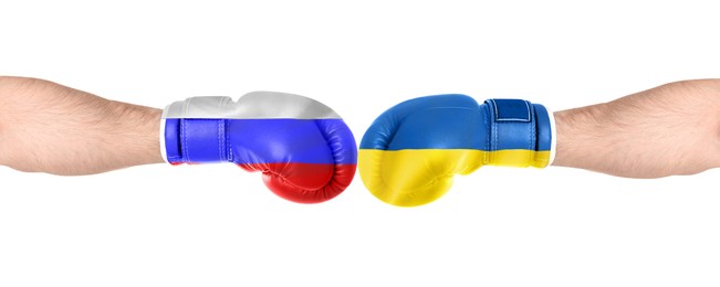 Political conflict. Men in boxing gloves with flags of Russia and Ukraine fighting on white background, closeup