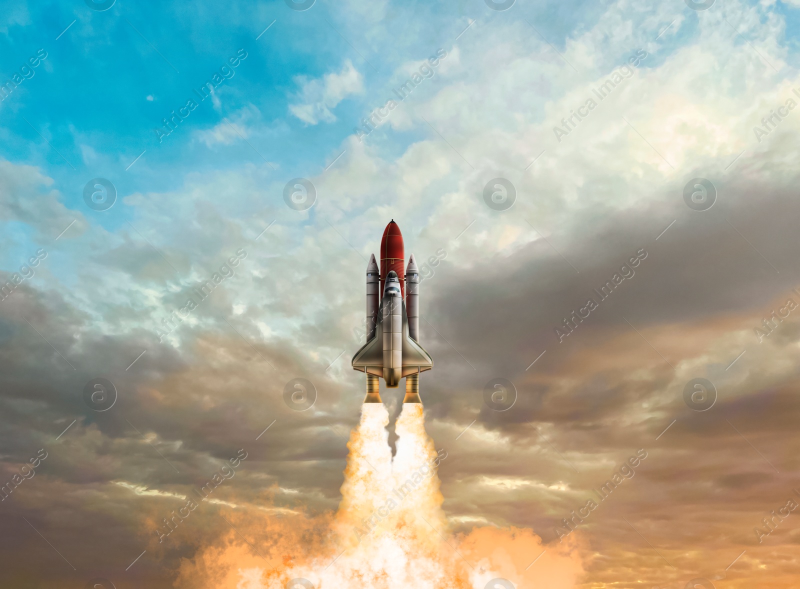 Image of Modern space rocket in beautiful cloudy sky