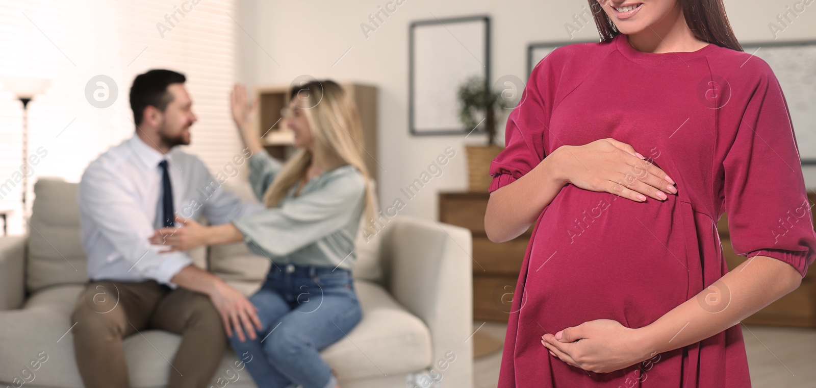 Image of Pregnant surrogate mother and happy couple at home, selective focus