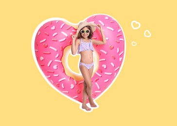 Happy little girl with heart shaped inflatable ring on beige background. Summer vibe