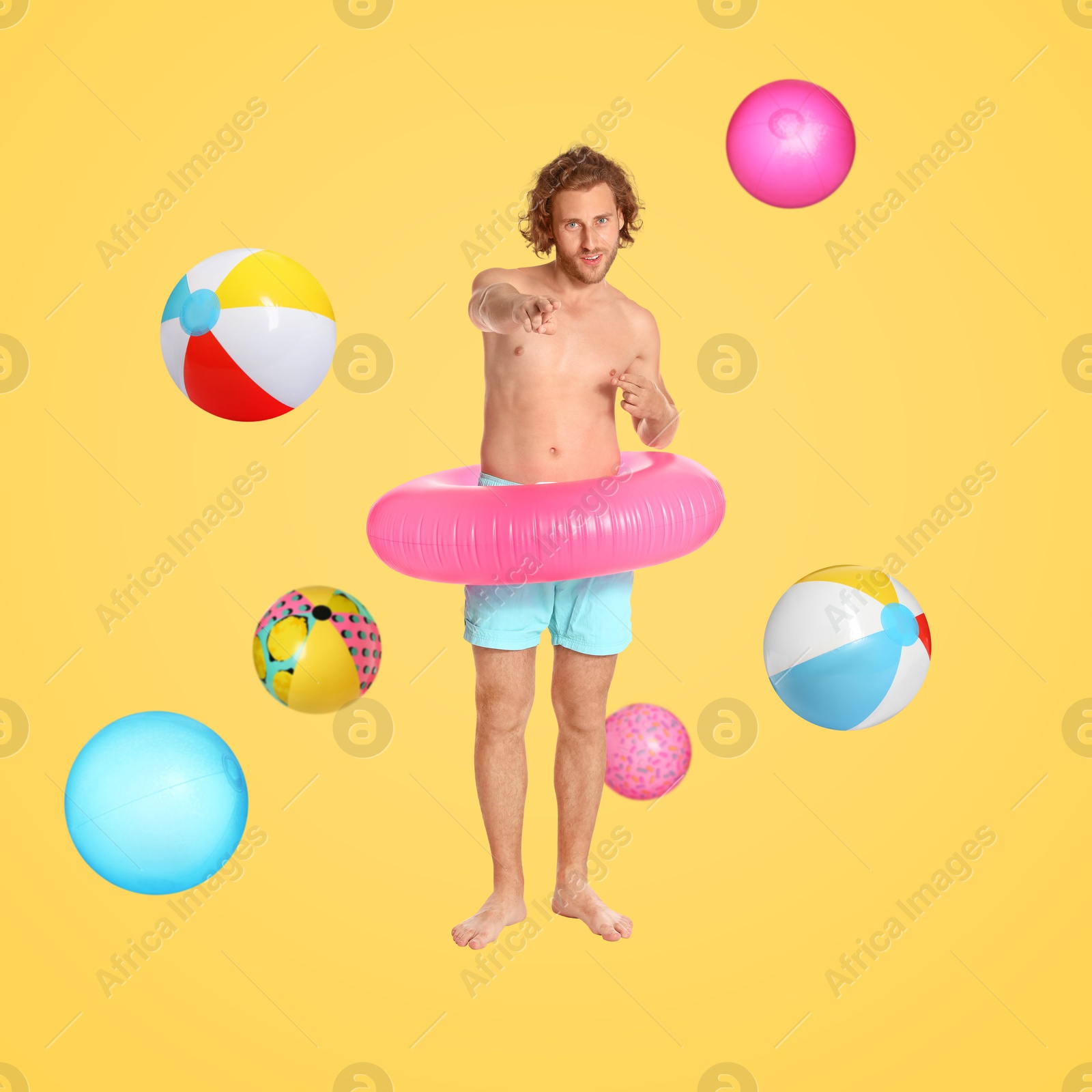 Image of Happy man with inflatable ring among falling beach balls on golden background. Summer vibe