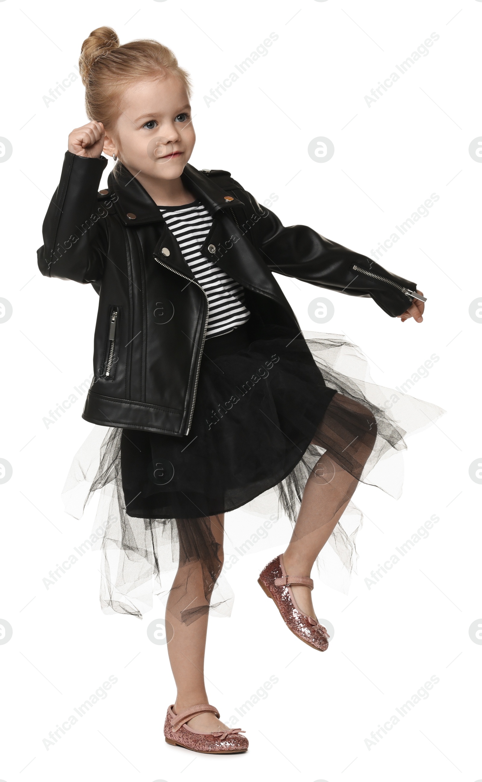 Photo of Cute little girl dancing on white background