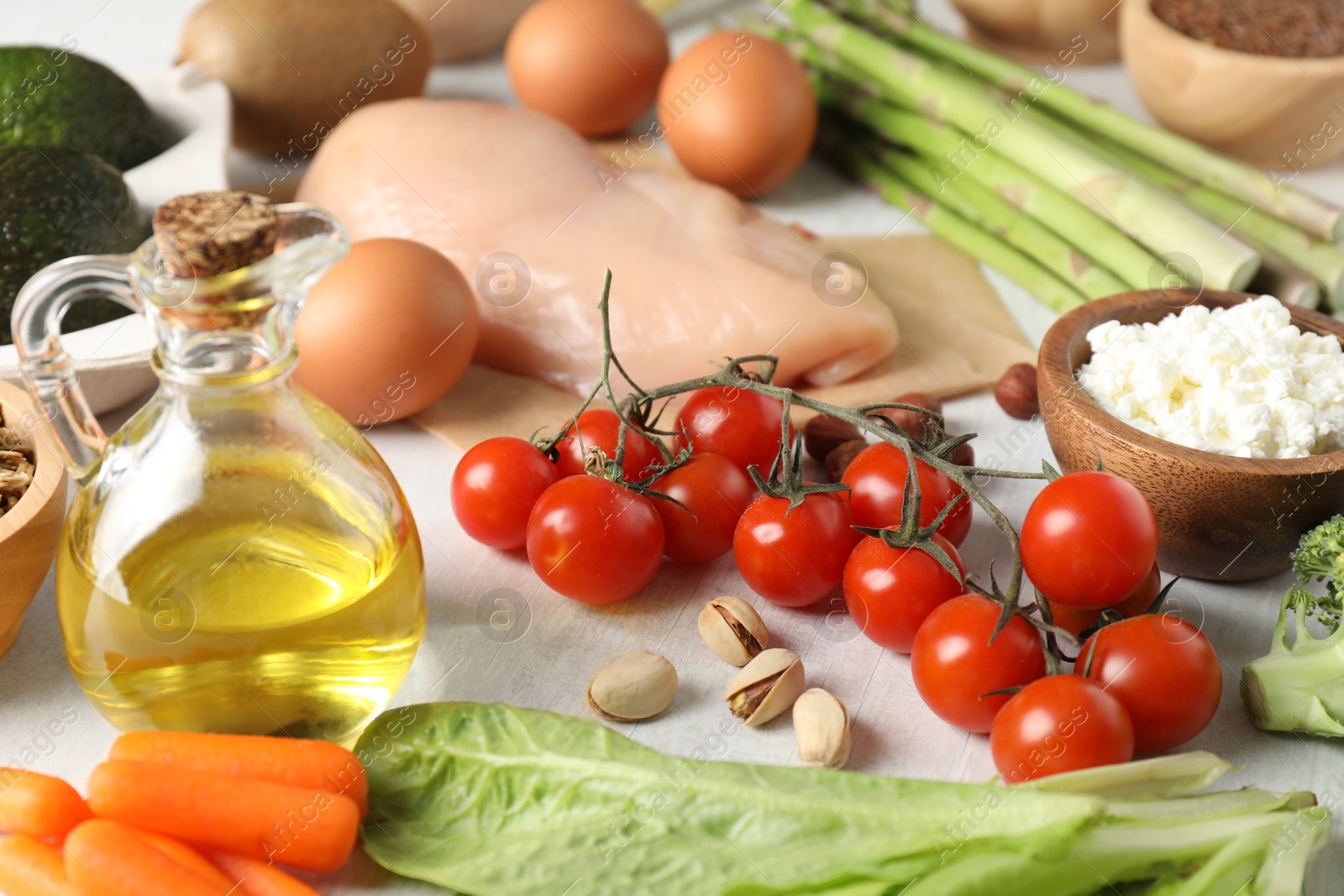 Photo of Many different healthy food on white table, closeup