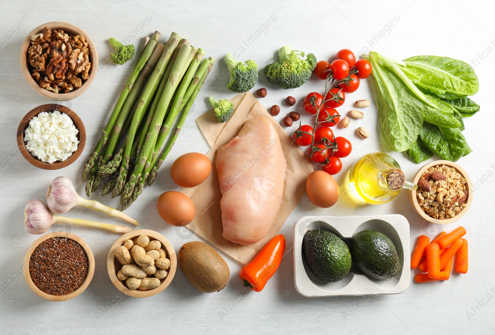 Photo of Many different healthy food on white wooden table, flat lay